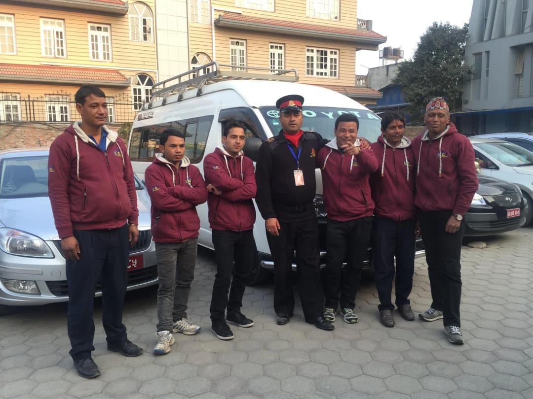 Woman in car with sunglasses